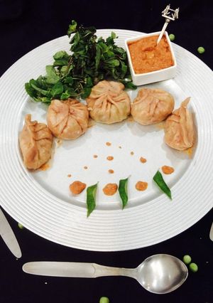 A picture of Soya granules stuffing Beetroot Momos.