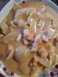 Lumaconi rellenos de ragú de setas y velouté de marisco
