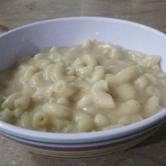 A picture of Pasta with white sauce.