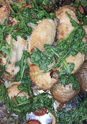A picture of Roasted Red Potatoes and Chicken Breast.
