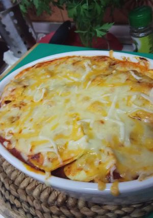 Una foto de Raviolis con pollo y queso