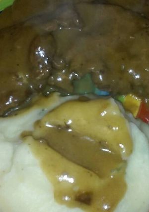 A picture of Liver Onions Homemade Gravy & Mashed Potatoes.