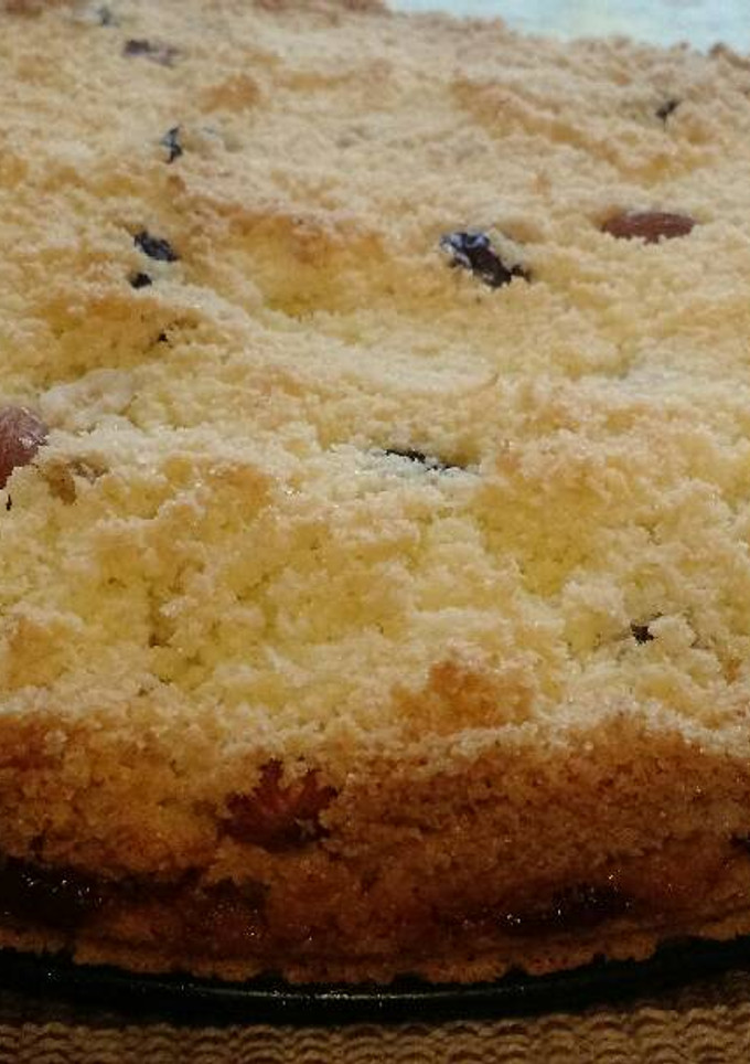 Una foto de Tarta de coco, dulce de membrillo y mix de frutos secos