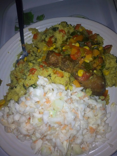 A picture of Stirfry Vegetable with couscous, coselaw& fried chicken.