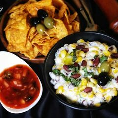 A picture of Cheesy corn beans.