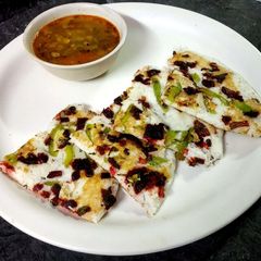 A picture of Beetroot uttapam.