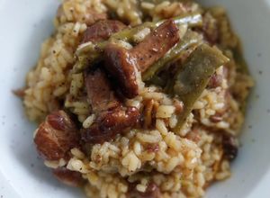 Foto principal de Arroz meloso con costillas, judías y surtido de setas
