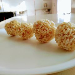 A picture of Murmura Ladoo (puffed rice).