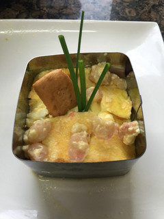 Una foto de Pastel de puerros y gambas