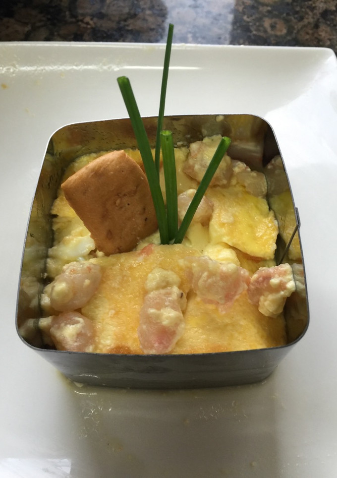 Una foto de Pastel de puerros y gambas