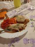 Milanesa napolitana de pollo con tomate
