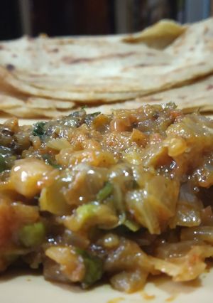 A picture of Laccha parantha with bharta.