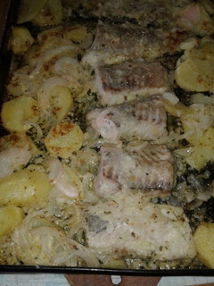 Una foto de Filet de merluza con papas a la crema