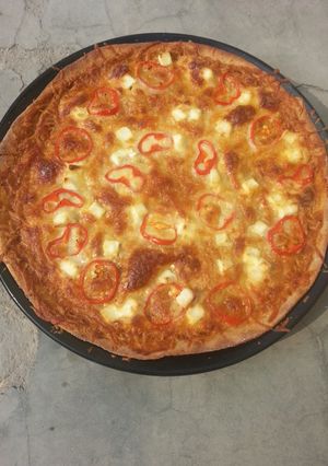 A picture of Spicy Paneer Pizza.