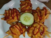 A picture of chips and sausage