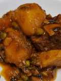 Estofado de costilla de ternera con champiñones