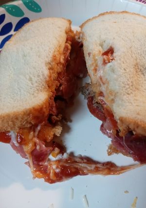 A picture of Leftover Pizza Topping Sandwich.