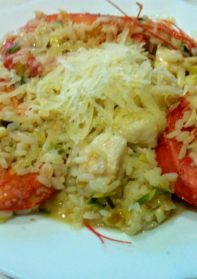 Una foto de Risotto con langostinos y pescado blanco