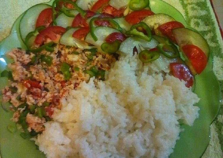 Steamed rice with scrambled eggs and cucumber salad
