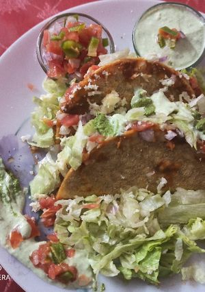A picture of Tangy Mexican tacos with hung Curd dip.