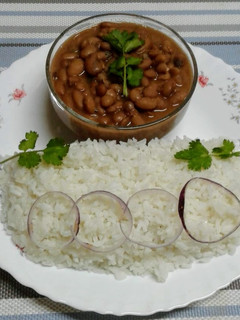 A picture of Simple rice and yellow beans.