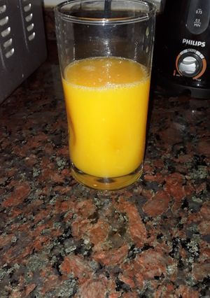 Una foto de Jugo de naranja. Grace
