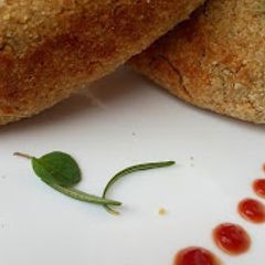 A picture of Baked herb fish rolls stuffed with mozzarella and corn.