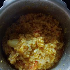 Makar sankranti special vegetable khichdi made with lapsi Dalia A picture of Makar sankranti special vegetable khichdi made with lapsi Dalia.