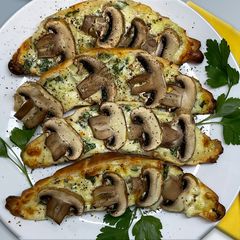 A picture of Croissants with Cheese, Mushrooms, and Garlic.