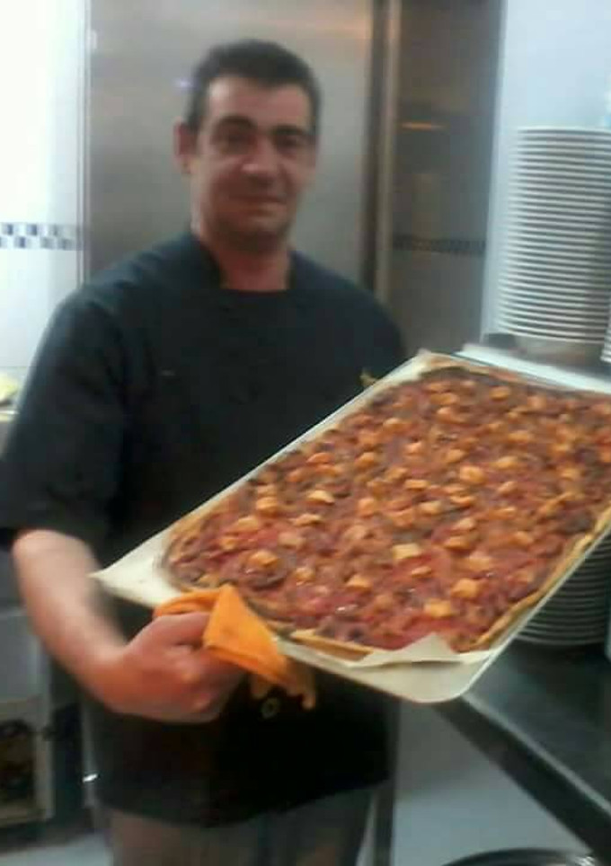 Una foto de Coca mallorquina