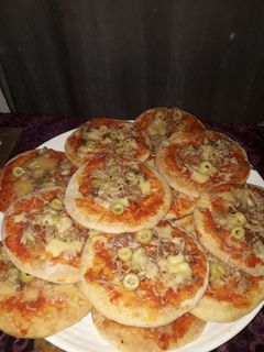 صورة لوصفة بيتزا بالطون هائلة
