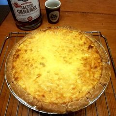 A picture of Xmas Quiche and tenn salted Carmel whiskey.