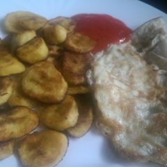 A picture of Shallow fried Plantain and eggs.