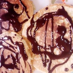 A picture of Pancake with chocolate toppings.