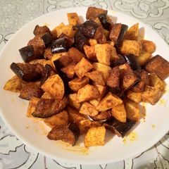 A picture of Spicy Potatoes And Aubergine.