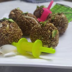 A picture of Til Peanuts and Coconut Chikki Balls.