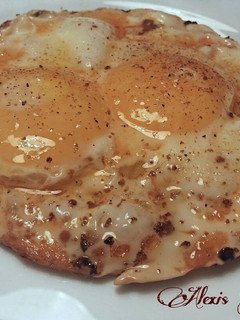Una foto de Torta de huevos fritos aliñados