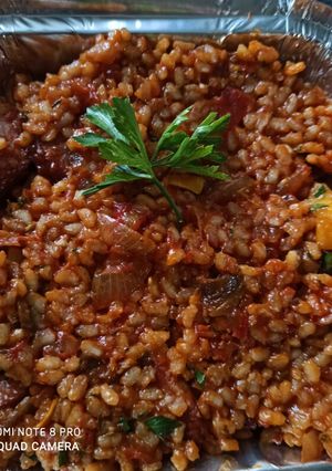 Une photo de Risotto saucisses fumées à la tomate
