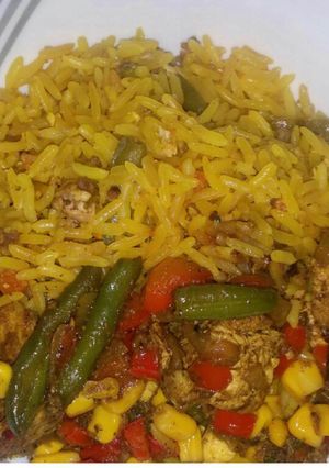 A picture of Chinese fried rice with mixed sauce.