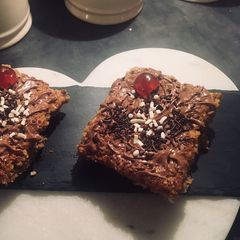 A picture of Chocolate and cherry flapjack.