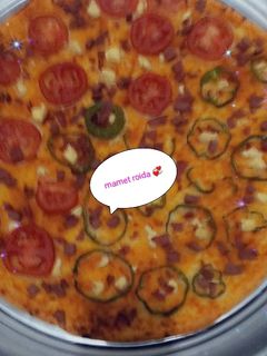 صورة لوصفة بيتزا الصاج سهلة واقتصادية 😋😋😋