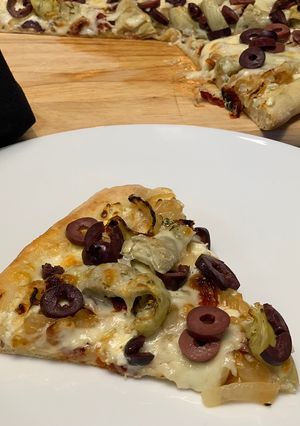 A picture of Artichoke, Sun-dried Tomato, and Goat Cheese Pizza.