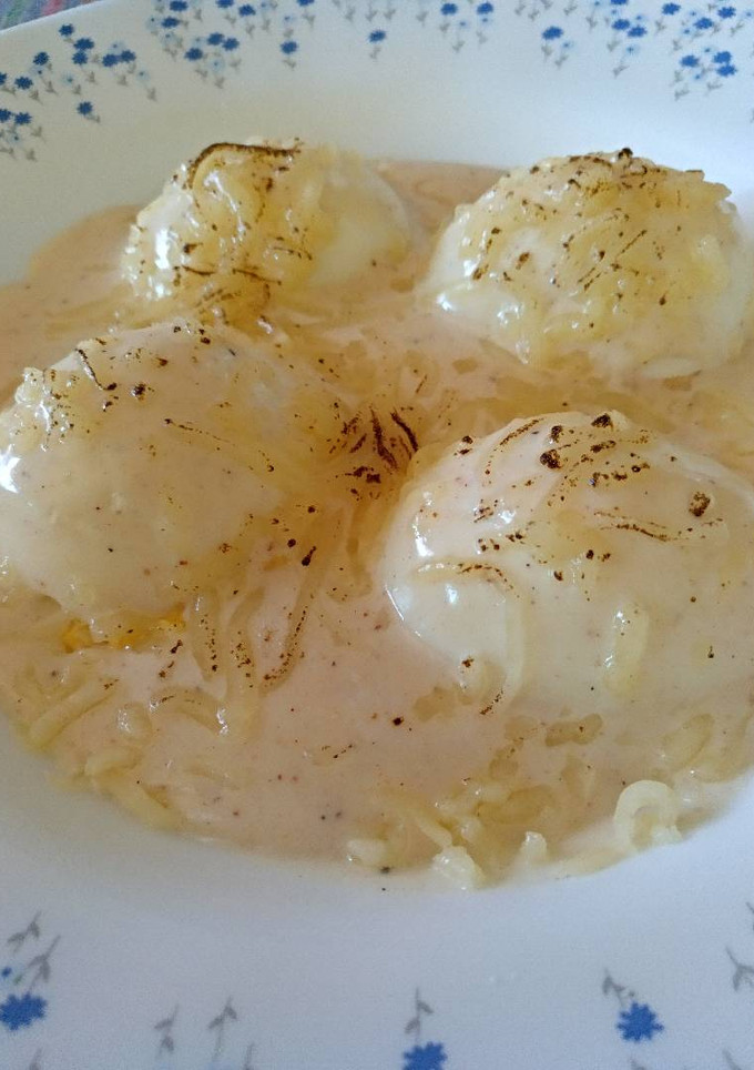 Una foto de Huevos con bechamel