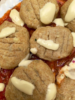 Una foto de Súper ñoquis rellenos de espinaca y queso