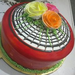 A picture of Fruit cake with oven base.
