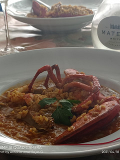 Una foto de Arroz meloso de bogavante y alcachofas