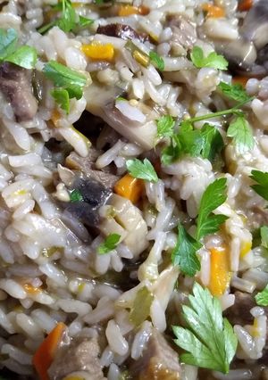 Una foto de Risotto de carne y champiñones