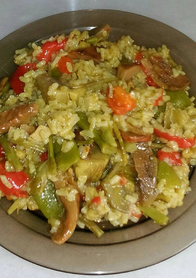 Una foto de Arroz con níscalos y verduras
