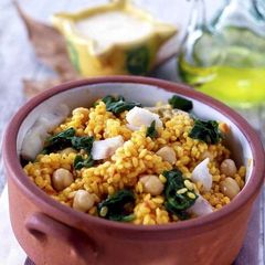 A picture of Rice casserole with spinach, chickpeas and cod.