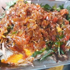 A picture of Roasted yam with ugba.